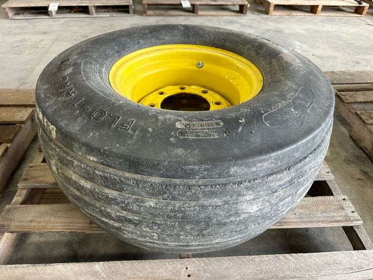 Titan Flo Trac Rib Tire on 8-Bolt Rim, 14 Ply.  Transport Tire for DB44 Planter.  Good, used tire.