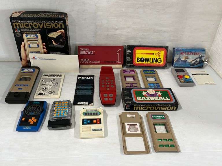 Older electronic games, most still in the original boxes, includes ...