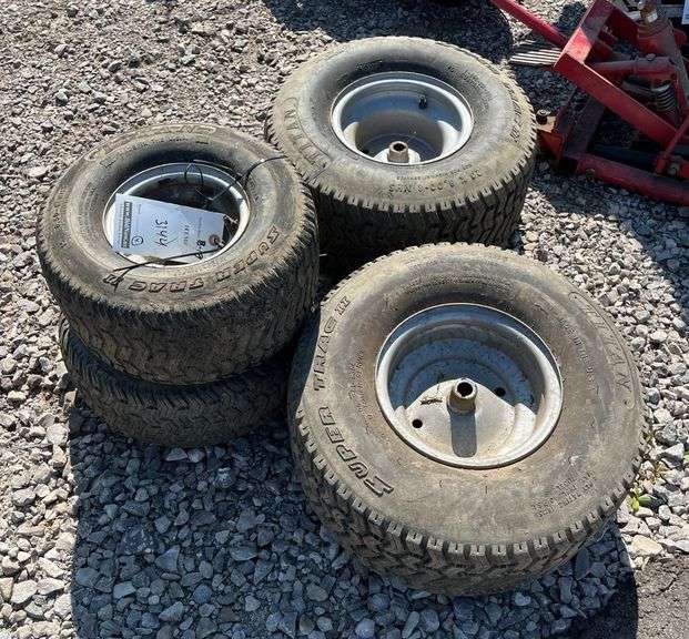 Rims and tires off a late 90 to early 2000s John Deere Sabre, fronts go ...