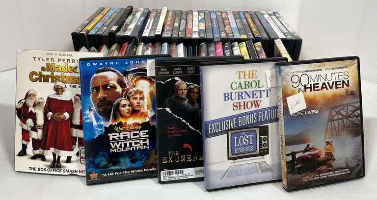 Over (55) DVDs, include: Shaft, Dream catcher, Braveheart, and more ...