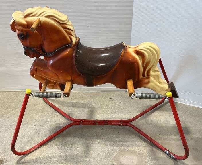 Older rocking horse with springs from the 1960's, no batteries needed ...