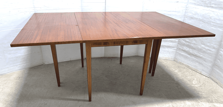 Wooden drop-leaf table, leaves down- 48"L x 24"D x 31"H, each side adds 20", very nice