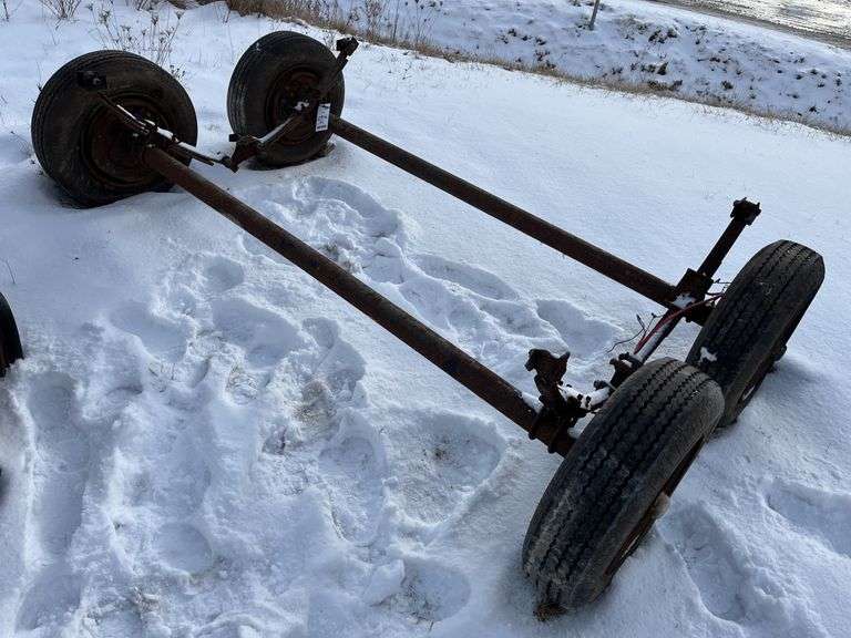 (2) House trailer axles with rim and tires, leaf springs, two 3500 ...