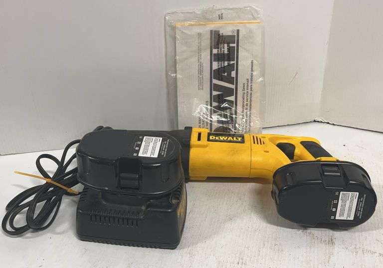 DeWALT sawzall, Model No. DW938, includes battery charger, two ...