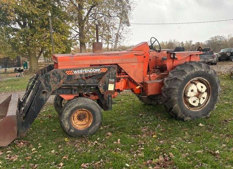 Allis-Chalmers 180 Diesel Tractor with a Westendorf TA 25 Loader, Has Good Front Tires, New Seat, Rear Wheel Weights and a New Injection Pump Rebuilt by Northern Diesel, Runs Well, Turn Key Starts Right Up