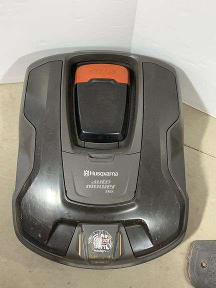 Husqvarna battery operated automower, comes with the charging docking ...