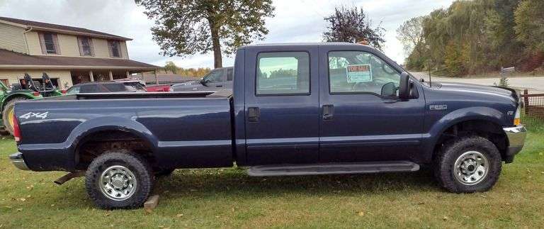 2002 Ford F250 4x4 Crew Cab Pickup, (Less than 117,000 Miles), 5.4L Engine, 6-Speed Manual Transmission, 8' Bed, Limited Slip Rear Axle, Rhino Spray-On Bedliner, Rollaway Bed Cover, Engine Does Not Show Any Codes, Original Owner, Clean and Clear Title, NOTE: See Questionnaire Pictures for Additional Information