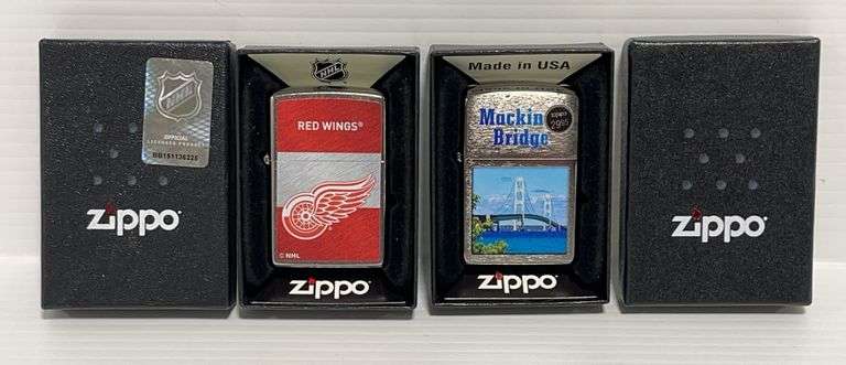 2) Zippo lighters: 1 - Detroit Red Wings, 1- Mackinac Bridge