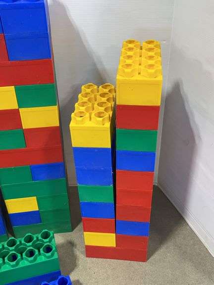 Over (100) Pieces of Jumbo building blocks, and a box filled with spike ...