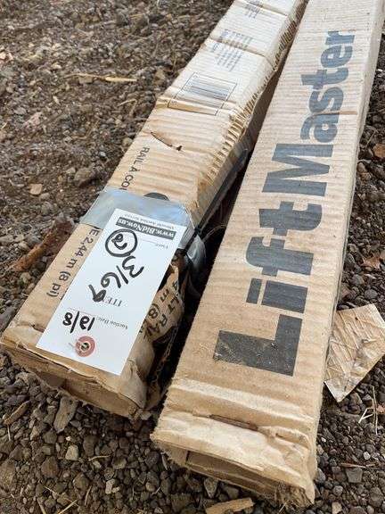 Lift Master Rails (2) Liftmaster 8' belt rails, both new - Albrecht Auction Service