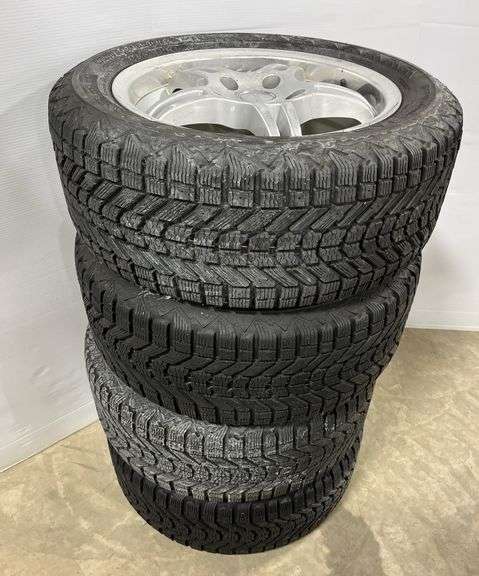 (4) Five-lug rims with tires, P225/50R16, 17