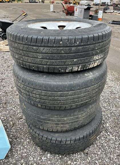 (4) Tires on steel rims, 60% tread, 245/70/R17, fair, fits Chevy trucks ...