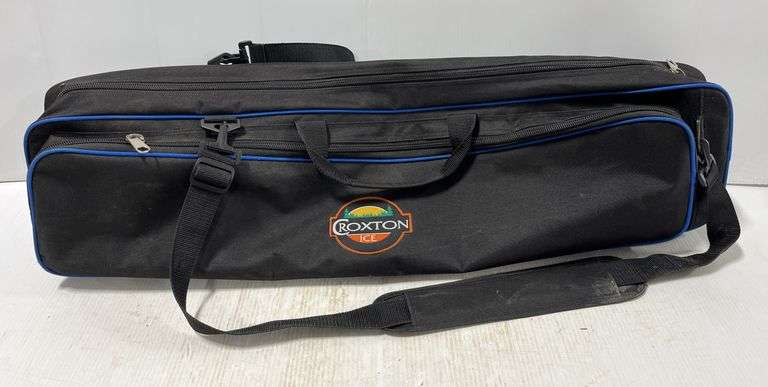 Ice fishing carrying case by Croxton, and (3) Fishing poles, 33