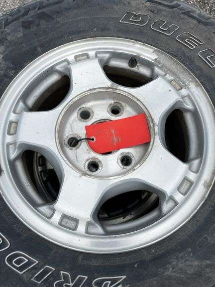 (2) Bridgestone Dueler A/T tires, P265/75 R16 on aluminum rims, fits ...