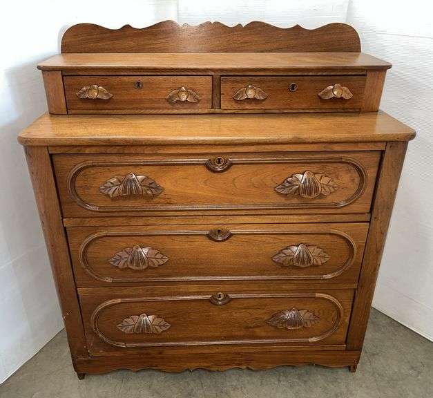 Antique walnut two over three drawer dresser with carved handles,  39"W x 19"D x 44"H, very good