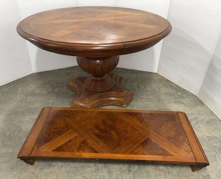 Solid oak table with leaf, 48"W x 48" x 30"H, and with leaf- 48" x 68" x 30"H, leaf- 20"