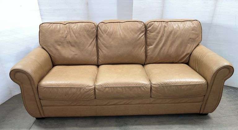 Three-seat leather couch, light brown in color, 82"W, some rubs
