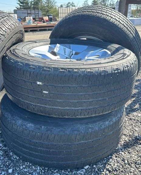 (4) Wrangler Goodyear 275/65R18 tires with rims - Albrecht Auction Service