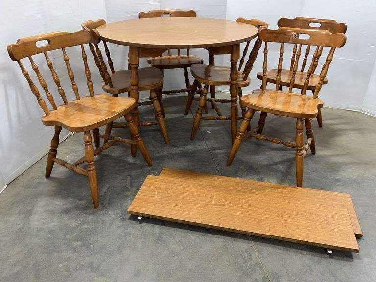 Older kitchen table with (6) chairs, and (2) leaves, each- 11 1/2"W, table- 42"Dia x 30"H, nice, some wear from use