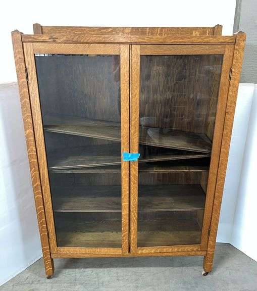 Antique mission style oak display cabinet with glass doors and keys, 41"W x 13"D x 54"H, doesn't stay latched/closed