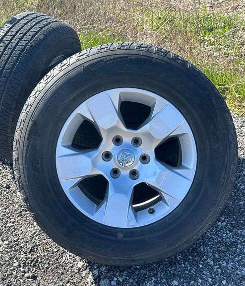 (4) Wrangler Goodyear 275/65R18 tires with rims - Albrecht Auction Service