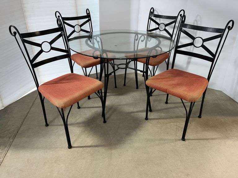 Glass top table with (4) Chairs, upholstery is faded but easy to reupholster seats or use as is, table- 42"Dia x 30"H, no chips