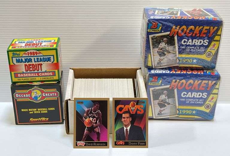 (2) 1990 Bowman Premier Edition Hockey Complete 264-Card Sets, Each Includes a Belfour Rookie Card; 1990-1991 Skybox 300-Card Basketball Set, Includes the #260 David Robinson Rookie Card, and the #300 Danny Ferry Rookie Card; (150) 1989 Topps Major League Debut Baseball Cards, Includes Ken Griffey Jr. Rookie Card and More; (126) 1986 Sportflics "Decade Greats" Magic Motion Baseball Cards