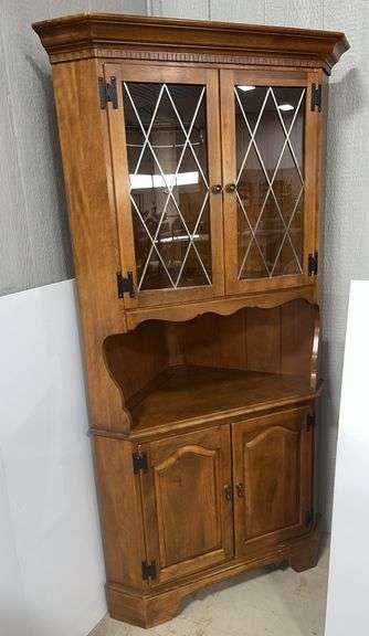 Corner cabinet with two sets of doors, glass front doors on top, 37"W x 26"D x 74"H, good, light wear