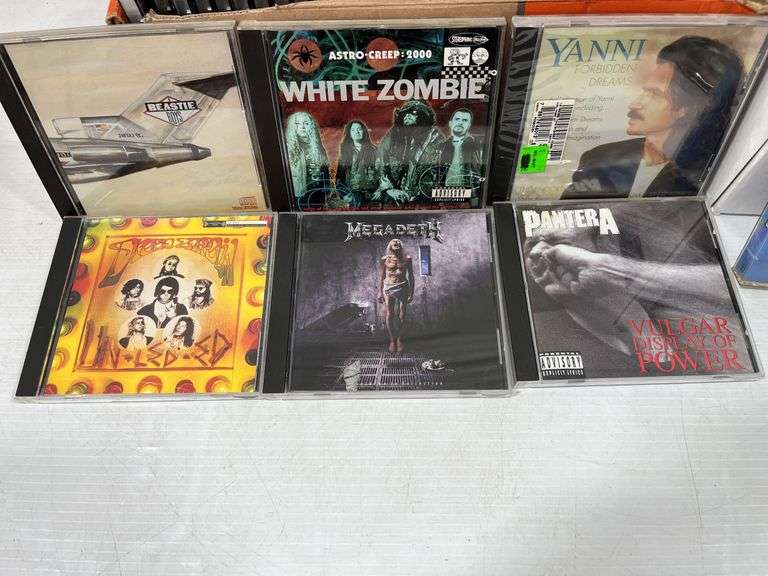 Older Rock and roll CD and cassette tape collection - Albrecht Auction ...