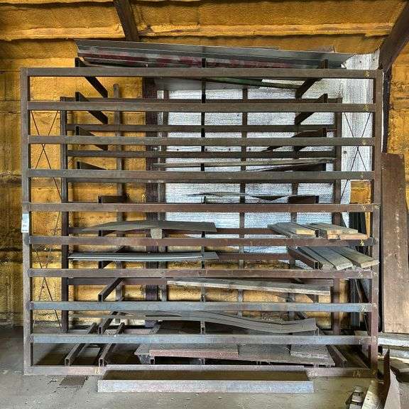 Heavy Duty Welded Steel Shelving Unit, 9'3" high x 10'9" wide x 41" deep and All the Contents (Aluminum Sheet Approx. 3' x 8' (14 ga?), Aluminum Sheet 4' x 4', 3/8" Plate Steel), 9" Between Each of the Front Rails.  NOTE:  Some materials may need to be hand loaded - bring help to load.  Help will not be provided for hand loading.