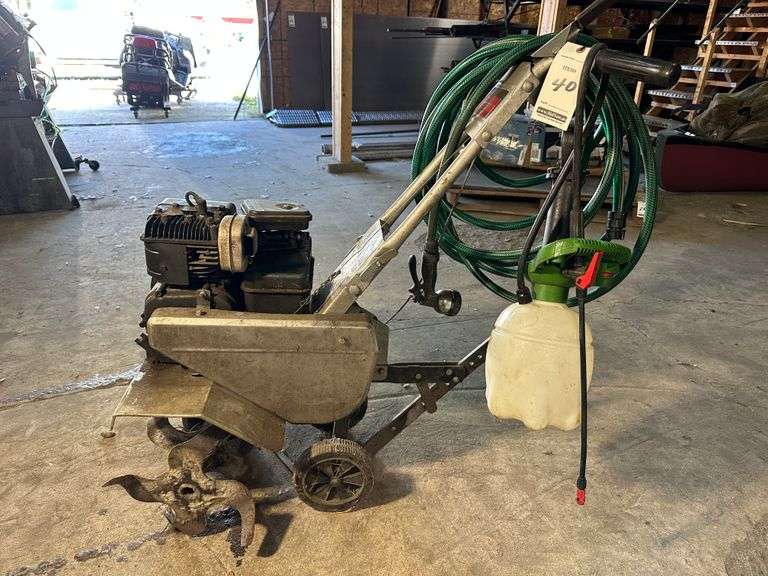 Craftsman Front Tine Rototiller with Craftsman 5 hp Engine, 22" Working Width. Comes with Pump Sprayer and Garden Hose.