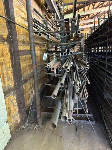 Material Rack (191" long x 86" high) and All the Contents (Misc. Square Tube & Pipe, Heavy Wall Tube, Round Stock), Assorted Sizes and Lengths (Several Long Pieces up to 24' long).  NOTE:  Some materials may need to be hand loaded - bring help to load.  Help will not be provided for hand loading.