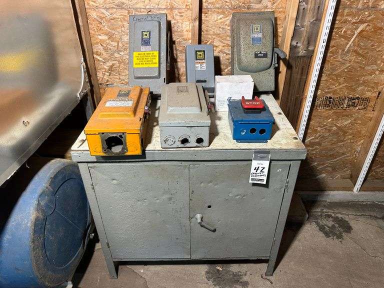 Steel Cabinet (24" high x 36" wide x 24"deep) with Contents. Contents include Motor Starters and Electrical Boxes