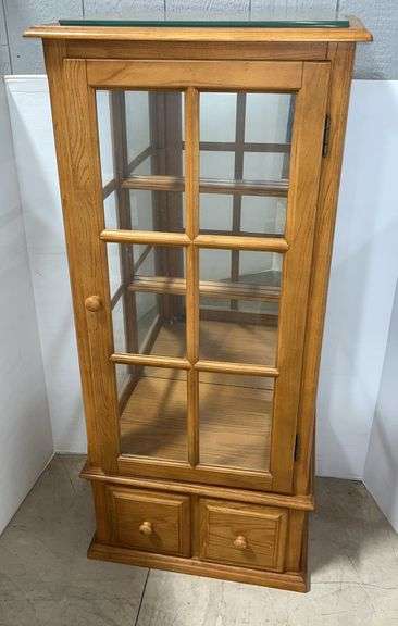 American Signature curio cabinet, lighted, 2-glass shelves, removable mirror back, 24"W x 18"D x 57"H
