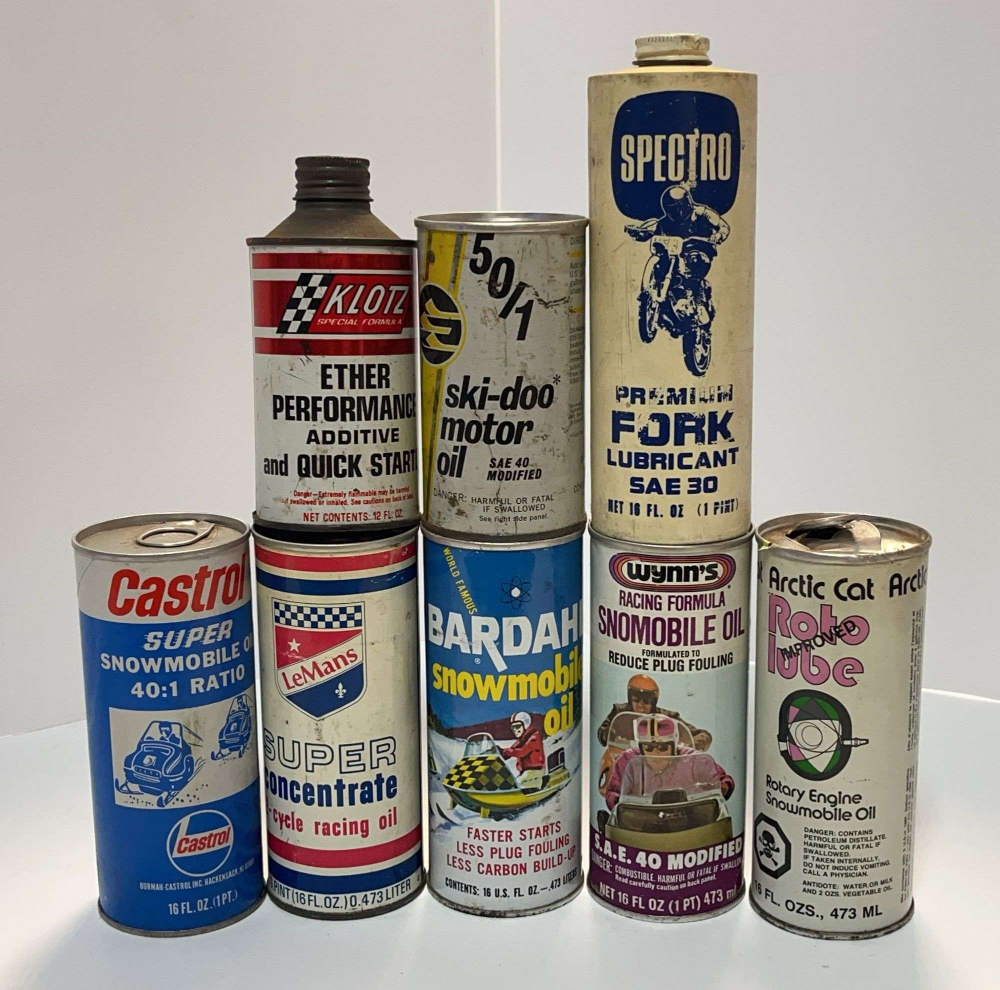 7) Vintage Snowmobile Oil Cans: 1- Klotz Ether Can, Empty; 1- Bel
