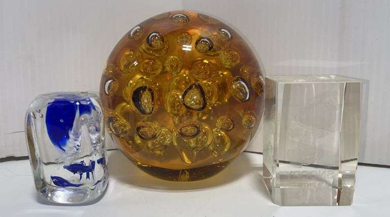 (3) Paperweights, includes: Amber ball, Snoopy, and 2- Dolphins, has a small crack, up to 5 1/4"H