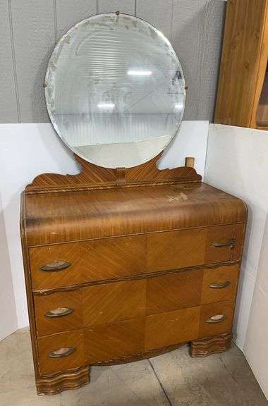 Old waterfall dresser, mirror not attached, 42"W x 21"D x 36"H, missing 2 pieces of Bakelite on pulls, has surface wear