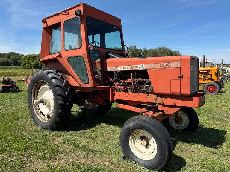 Allis Chalmers 200 D Tractor with Cab, 3-pt., PTO, Hydraulics, Over/Under Hydraulic Shift, 14.9-38/13-38 (holding air), One 7.50-16 Front is Flat, Clean Tractor, Running Condition Unknown