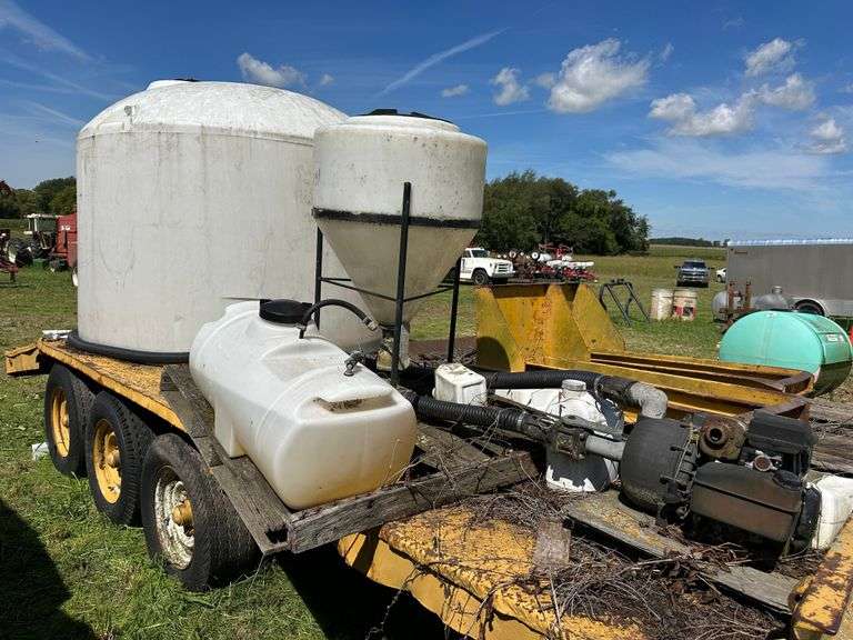1500 Gallon Poly Tank with Inductor Pump, Plumbing.  Engine on Pump Not Good.  NOTE:  Trailer visible in pictures is Not Selling in the auction.