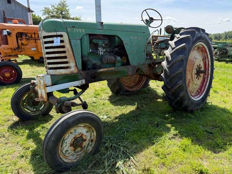 1955 Oliver Super 66 Row Crop w.f. Tractor, Ser. No. 27732, Gas, 13.6-38 Rears (one flat), Engine is Free, Running Condition Unknown