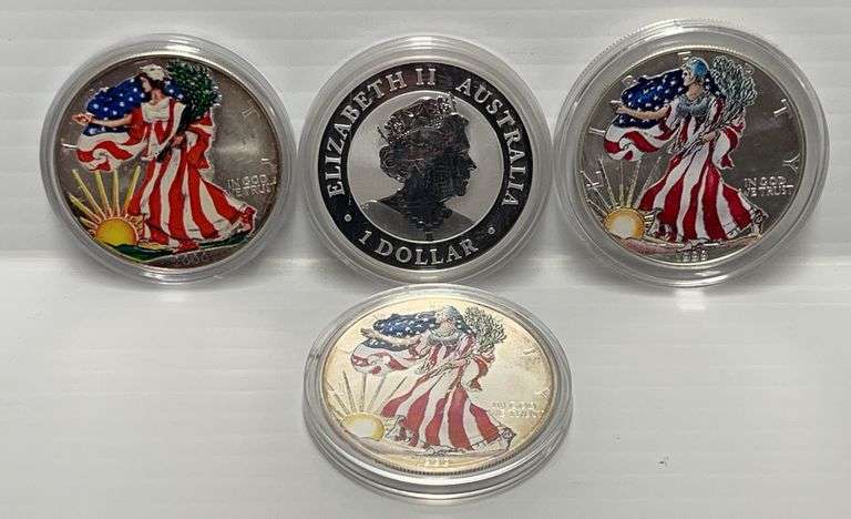 (4) .999 Silver rounds: 3- Colorized silver eagles, and 1- Australia ...