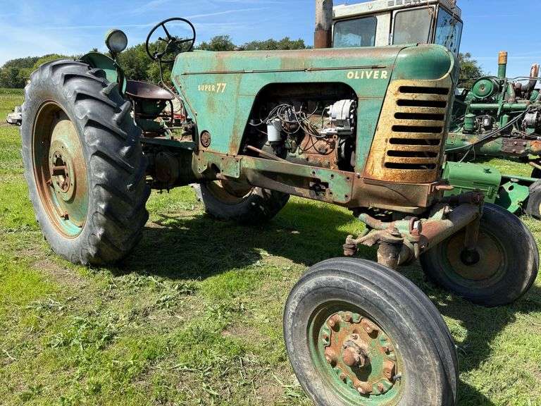 1955 Oliver Super 77 w.f. Row Crop Tractor, Ser. No. 27973-702, Gas, PTO, 14.9-38 Rears (hold air), Engine is Free, Running Condition Unknown