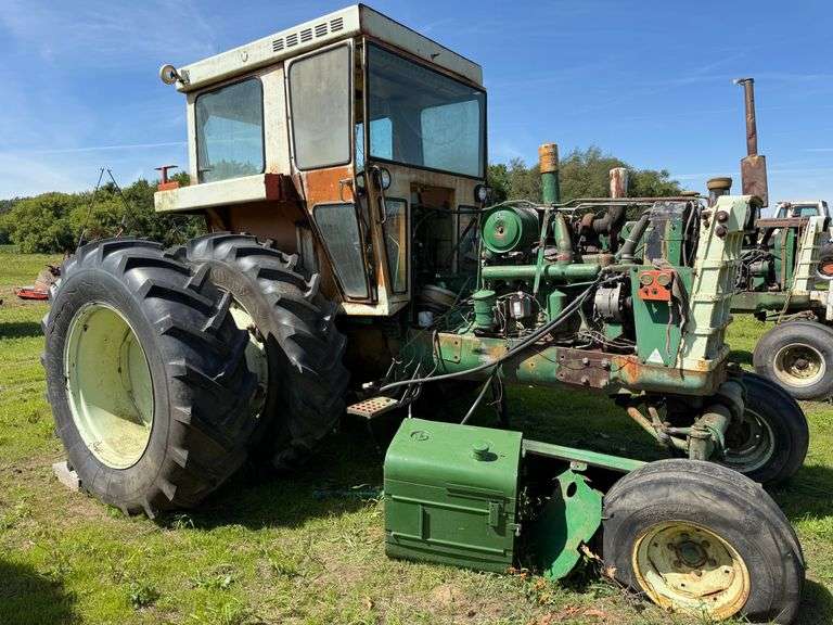 1972 Oliver 1955 Dsl. w.f. Tractor with Cab, Ser. No. 236299-692, 3-pt., PTO, Hydraulic Outlet, Rear Inside 16.9R38 (good), 18.4-34 Rear Duals.  One front 11L-15 Tire is bad.  NOTE:  Thought to run but fuel tank leaked so it was torn apart.  Tank was repaired.