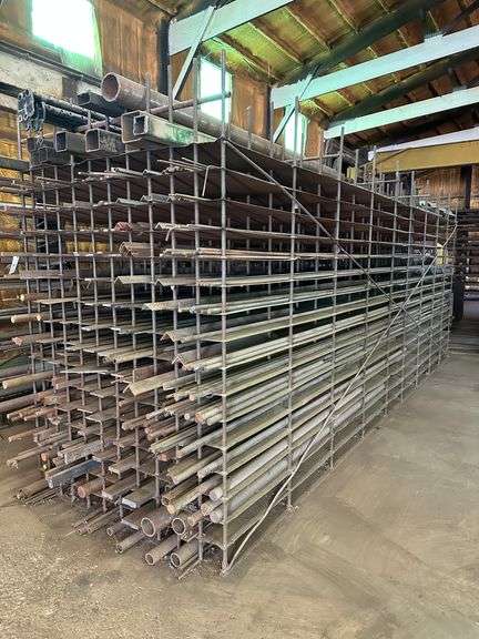 Material Rack (241" long x 8' high) and All the Contents (Misc. Square Tube, Flats, Angles, Hot Roll Round, Cold Roll Round, Square Stock, Hex Stock), Assorted Sizes and Lengths (Several Long Pieces up to 20' long), Thousands of Dollars in Material!  NOTE:  Some materials may need to be hand loaded - bring help to load.  Help will not be provided for hand loading.