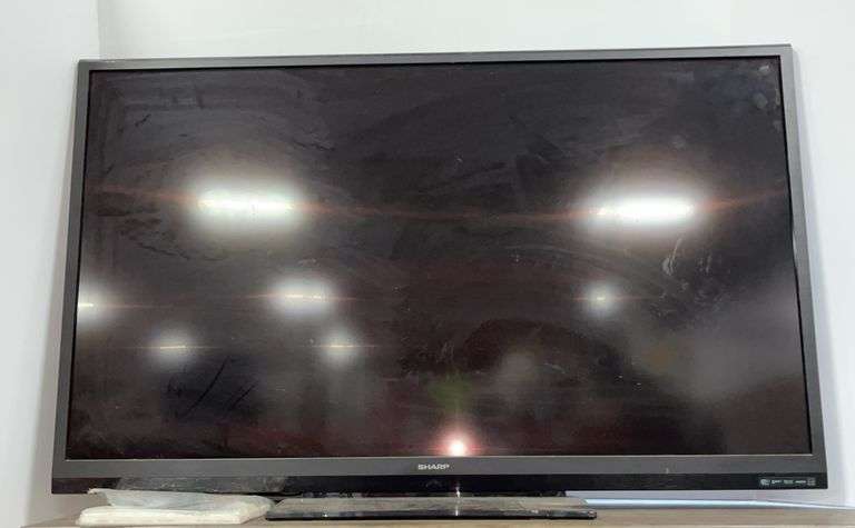 Sharp TV with remote and manuals, 60", good