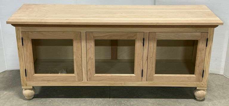 New Maple TV stand, unfinished, comes with (4) Bunn feet that could be attached underneath if mounting board is shortened, comes with knobs for doors, but no glass, 55"W x 17"D x 20"H, NOTE: It is recommended to sand this furniture again before finishing