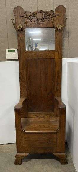 1970s Wood hall tree with coat hooks, mirror, storage space, and claw feet, 23"W x 18"D x 75"H, very nice