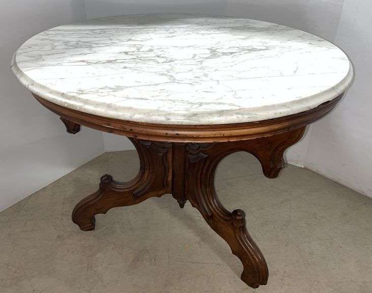 Marble Top Table with a Carved Base