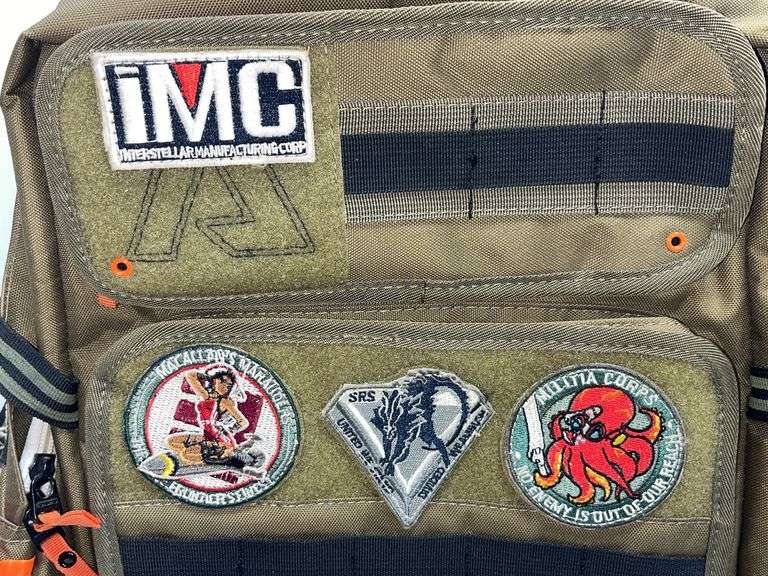 Backpack and Patches - Albrecht Auction Service
