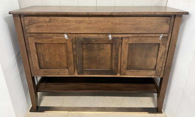 New Maple sideboard to assemble, top and doors are not attached, hinges and knob for doors and drawer are included, center door is a little darker color, (5) shelves are included, 58"W x 19"D x 42"H